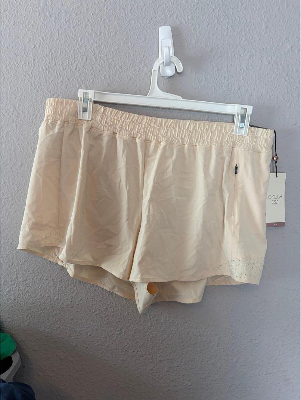 NWT Calia Mid-Rise Infinity Short 3in inseam Washed Peach size XL. $40 retail.